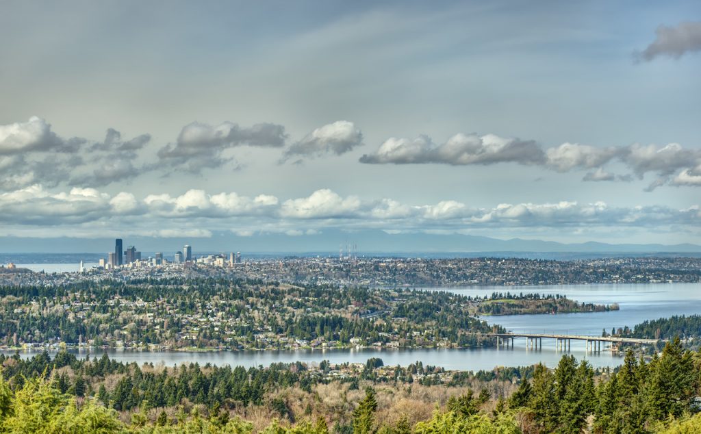 Beautiful Lake Washington Snakes and Turns in the Foreground as the Seattle Skyline Sits Quietly in the Distance